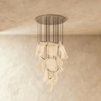 Clérachic iridium silver chandelier with tiered metal bars holding glowing acrylic panes below its ceiling plate.