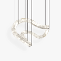 Clérachic Ethereal chandelier on white, one continuous alabaster ribbon looping on slim cables.