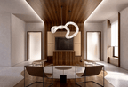 Clérachic Ethereal chandelier under a walnut ceiling above a curved sofa and dark canvas.