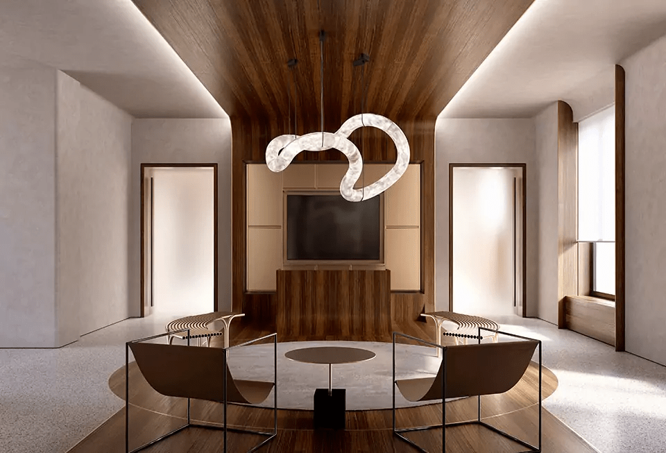 Clérachic Ethereal chandelier under a walnut ceiling above a curved sofa and dark canvas.