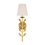 Clérachic's Evoque sconce in polished brass, its glossy leaf cluster set beneath a cream shade.