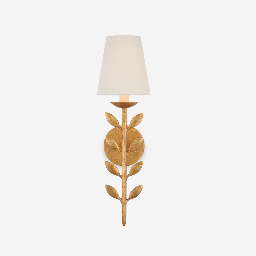 The Clérachic Evoque sconce in antique gold leaf, photographed against a soft grey studio backdrop.