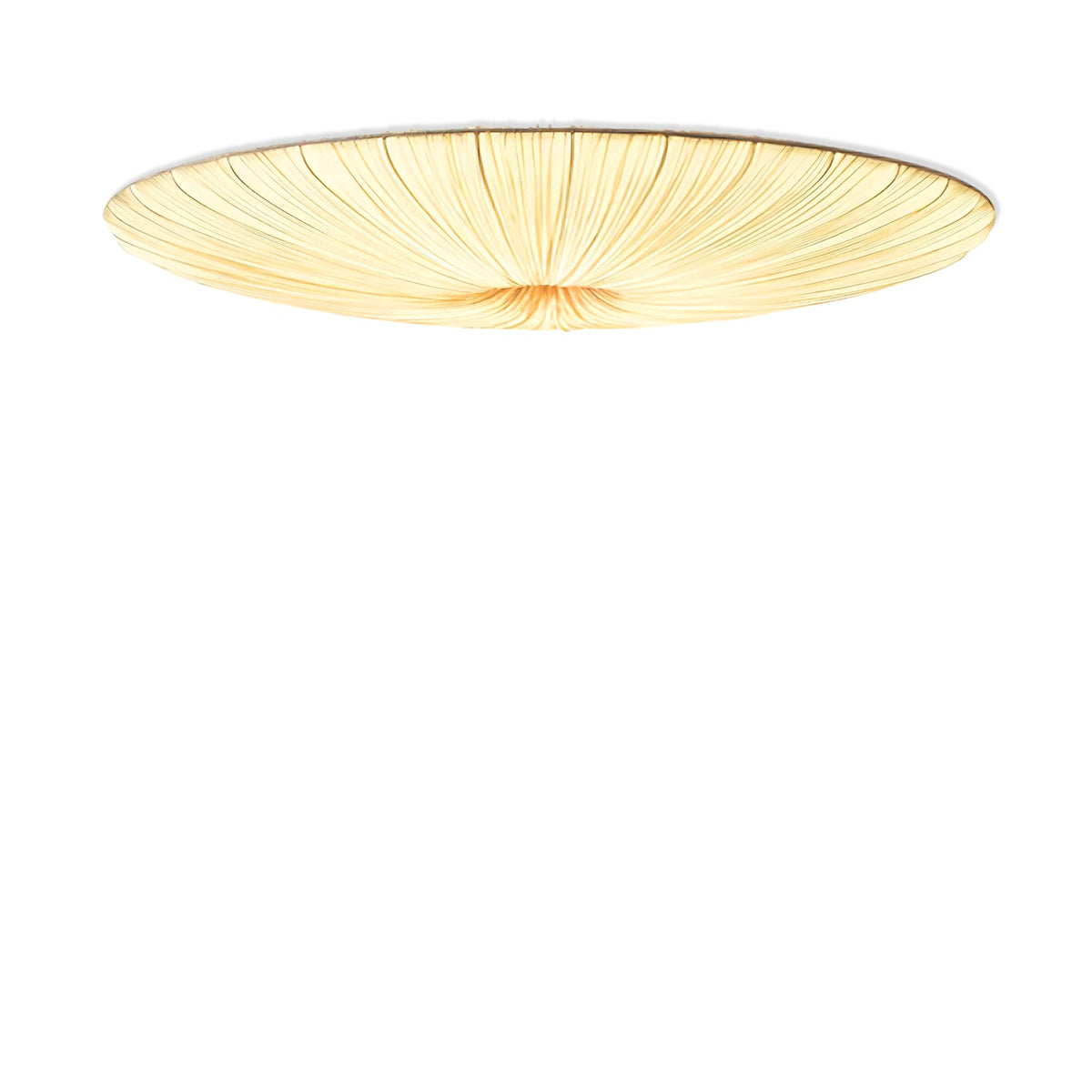 Clérachic pleated fabric ceiling light on a plain white backdrop, lit warm, with a thin dark edge at the rim.