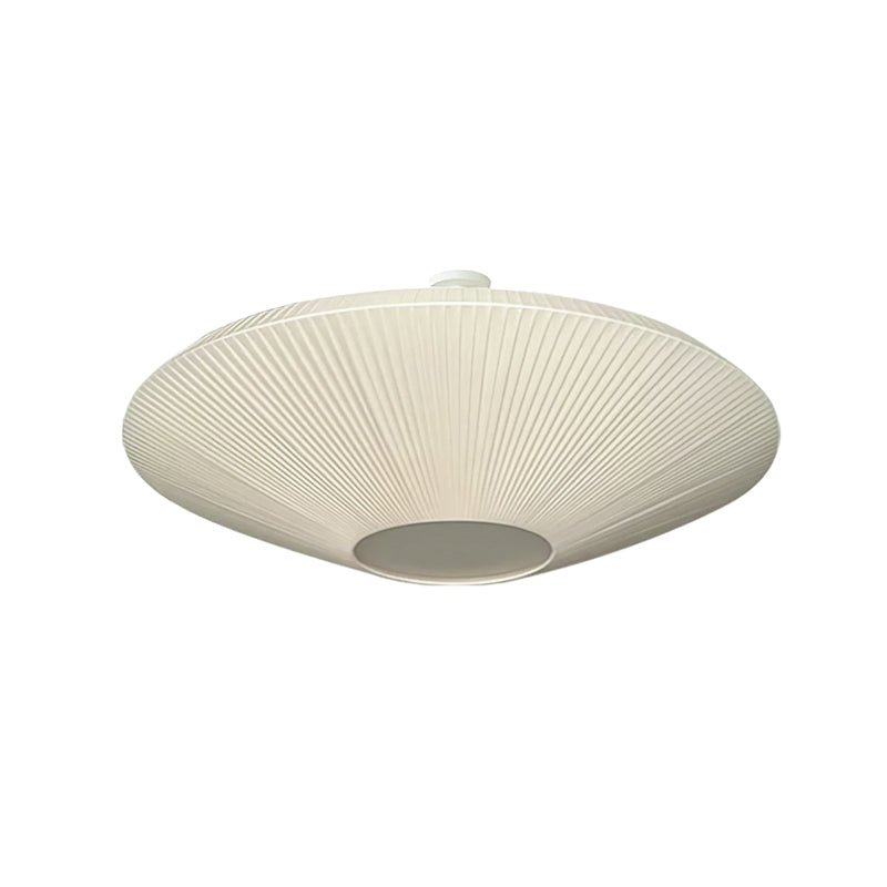 Ivory Clérachic pleated ceiling light with a short stem and a pale central panel, on a white background.