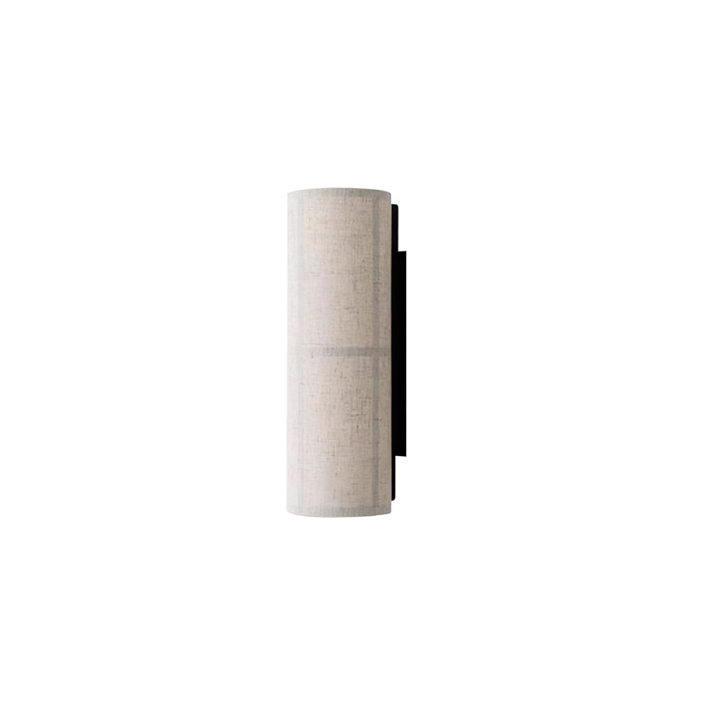 Grey-linen Clérachic wall light, unlit, on a white backdrop, its textured fabric shade and black back plate in profile.