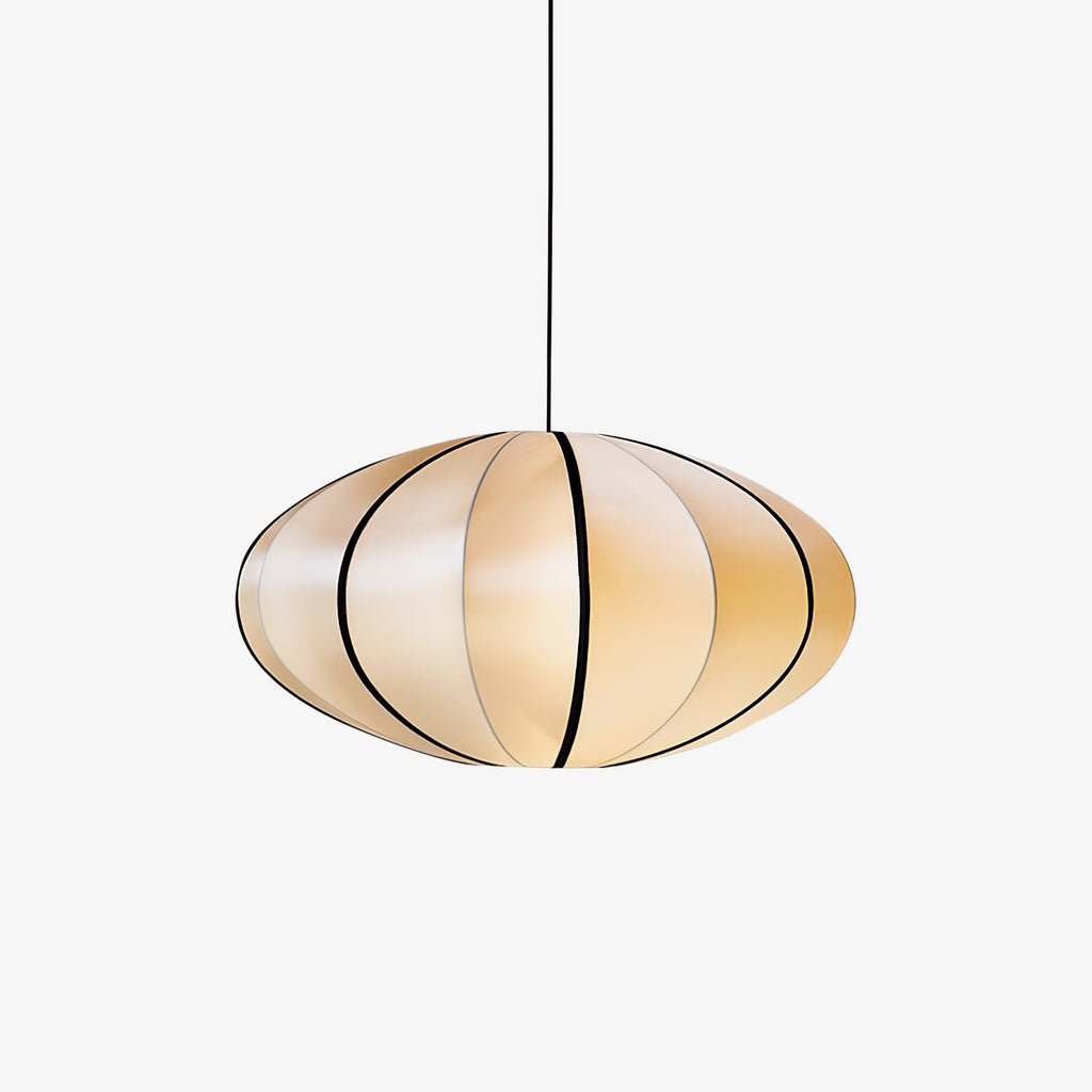 A rounded, flattened fabric pendant with black ribs and a warm glow hangs on a black cord against a plain pale backdrop, this Clérachic pendant.