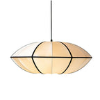 A wide fabric pendant with a pointed black rim and ribs hangs on a black cord against a white backdrop, from Clérachic.