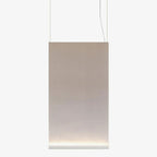 Tall Clérachic fabric pendant with a white bottom bar, hung on two wires, the fabric fading from taupe to cream at the base.