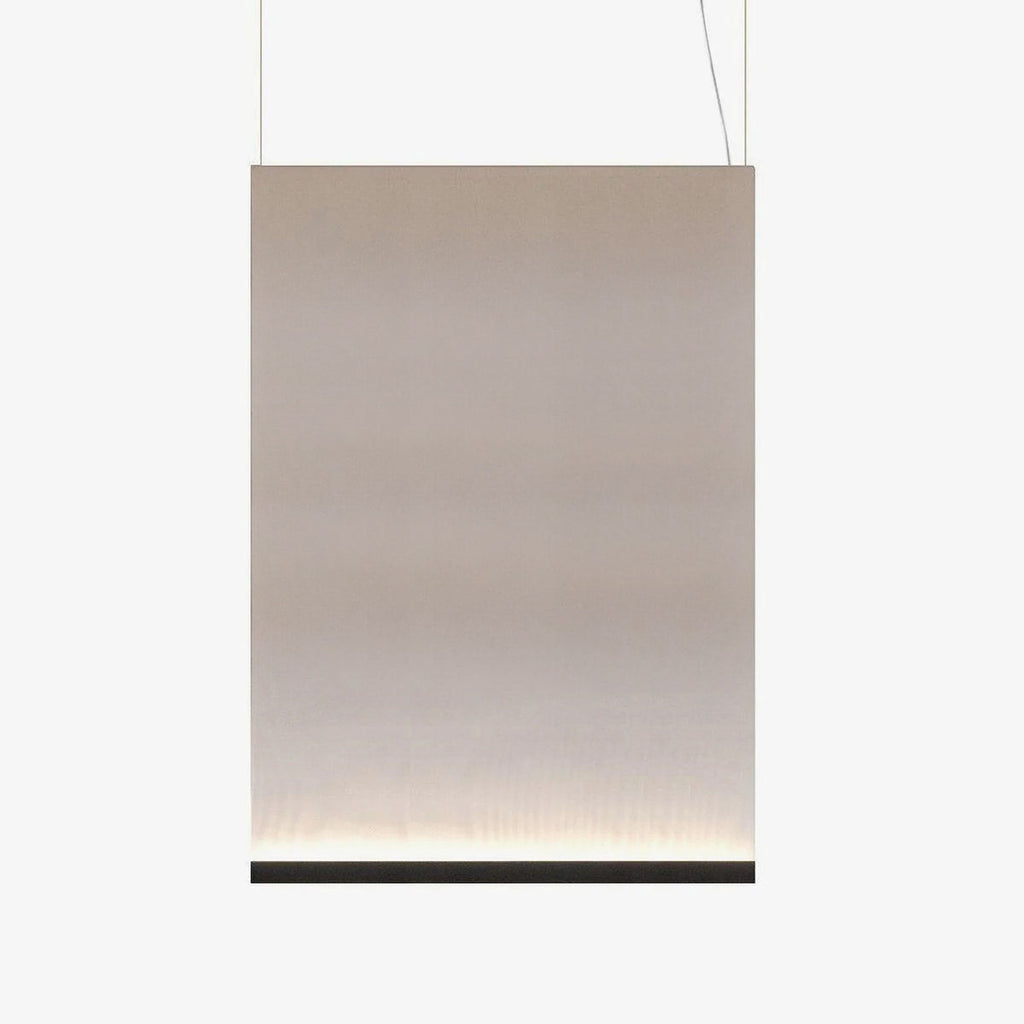 Large tall Clérachic fabric pendant with a black bottom bar and two thin wires, the taupe fabric fading to a pale lit base.