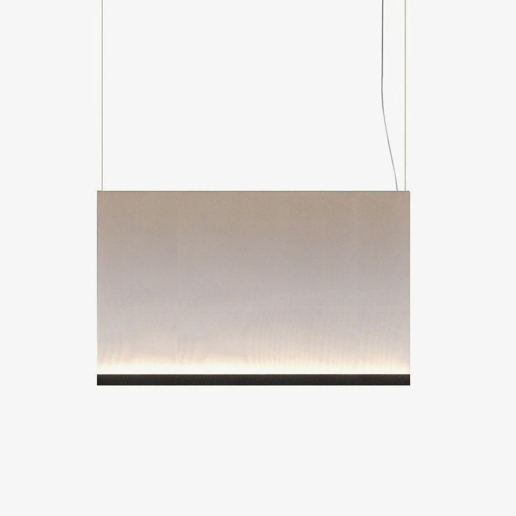 Wide, low Clérachic fabric pendant with a black bottom bar, hung on two wires, glowing softly along its lower edge.