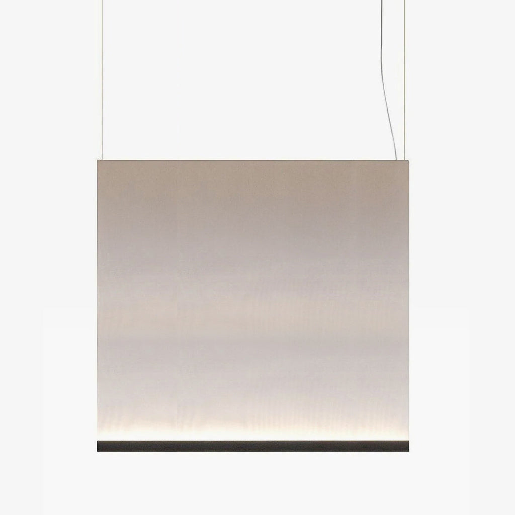 Broad Clérachic fabric pendant with a black bottom bar, hung on two wires, the taupe fabric fading to a lit base.