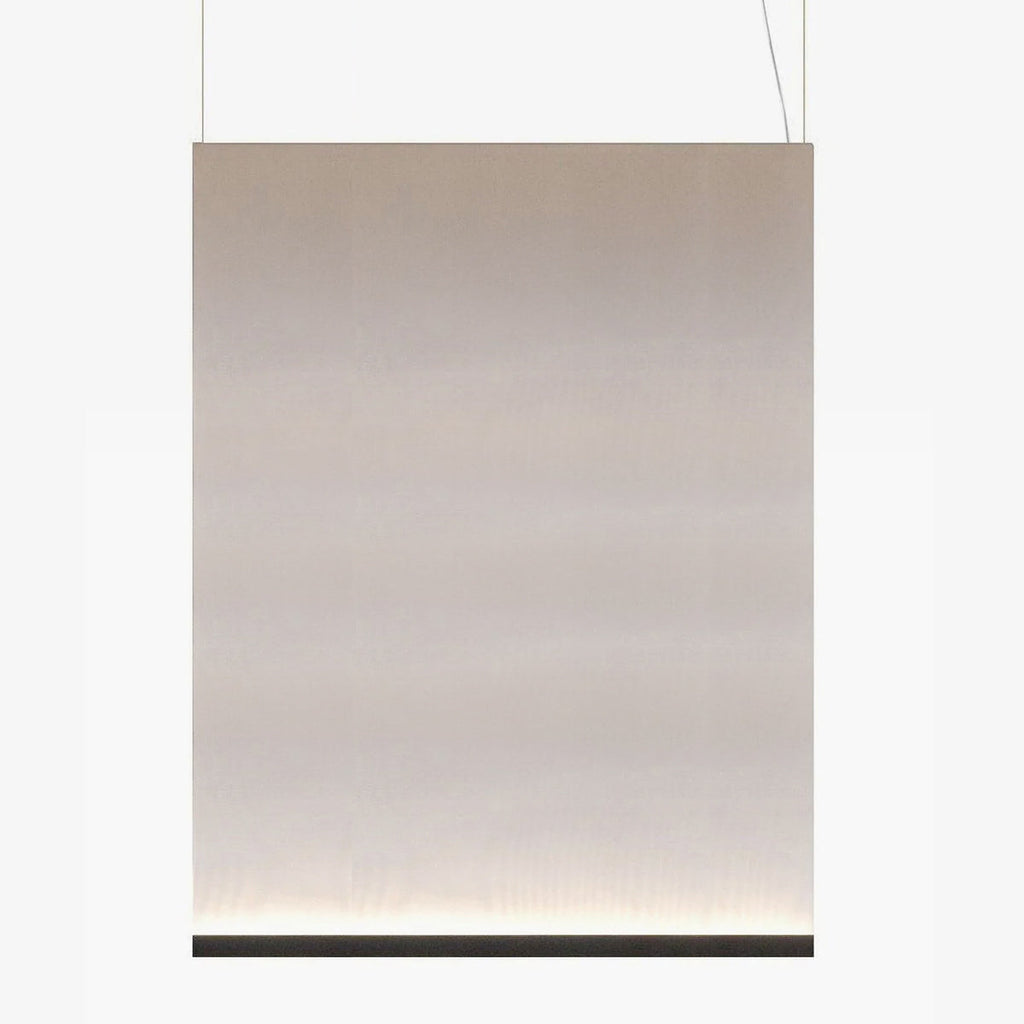 Large portrait Clérachic fabric pendant with a black bottom bar, on two thin wires, with the taupe fabric glowing at the base.