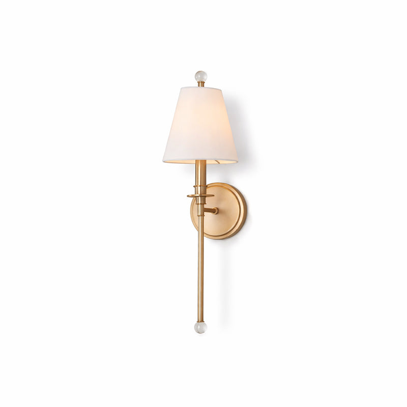 Gold-toned Clérachic wall light with a white fabric shade and glass ball ends, shown whole on a plain white backdrop.
