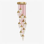 Alabaster cone drops cascade down red cords on this Clérachic chandelier, shown on a plain background.