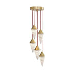 Four brass-capped alabaster drops on this Clérachic chandelier stagger down red cords, shown on a plain background.