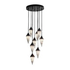 A wide spiral of black-capped drops on this Clérachic chandelier fills the frame on a plain background.