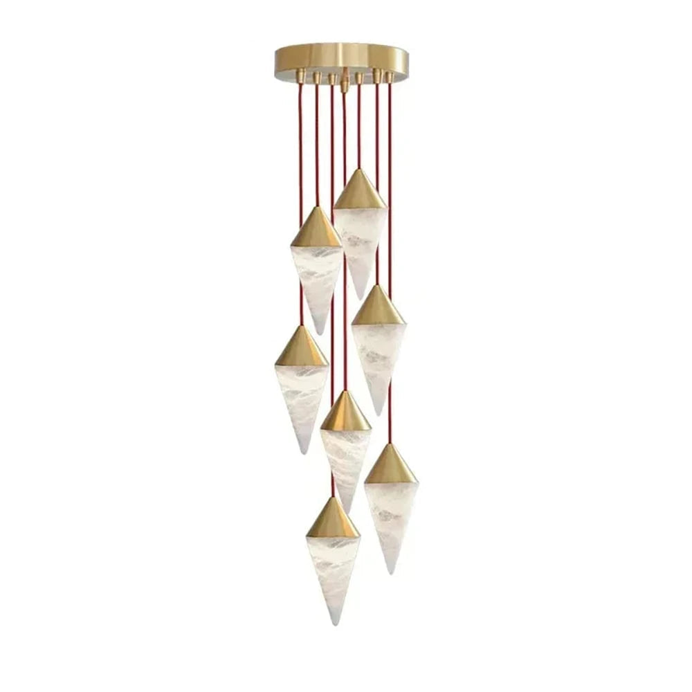 A round brass ceiling plate holds this Clérachic chandelier's spiral of drops on red cords, on a plain background.