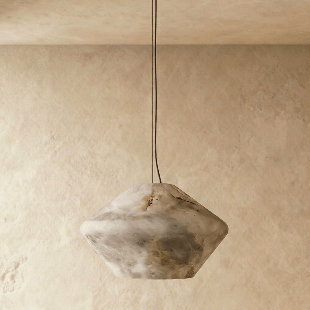 Clérachic alabaster pendant switched off, showing the grey and honey veining of its faceted double-cone stone shade.