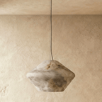 Clérachic alabaster pendant switched off, showing the grey and honey veining of its faceted double-cone stone shade.