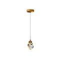Clérachic single crystal pendant light hanging from a round gold canopy on a fine cord, shown on a plain white ground.