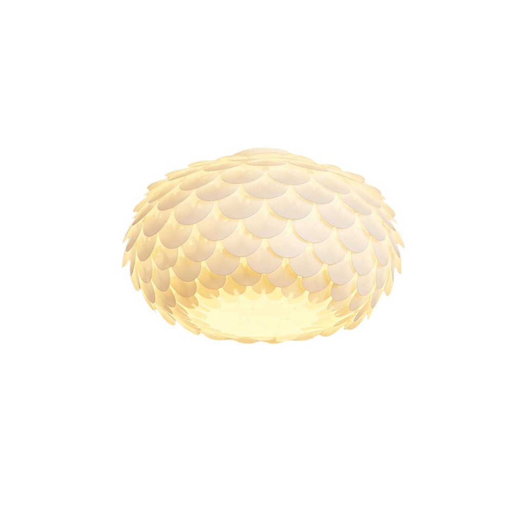 Clérachic oval ceiling light in warm white light, its scales glowing softly, on a white background.