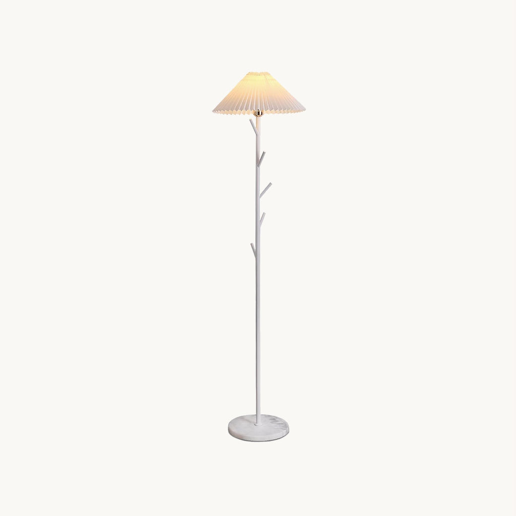 White Clérachic floor lamp with a pleated shade, branch-style pole and marble base, shown on a plain off-white backdrop.