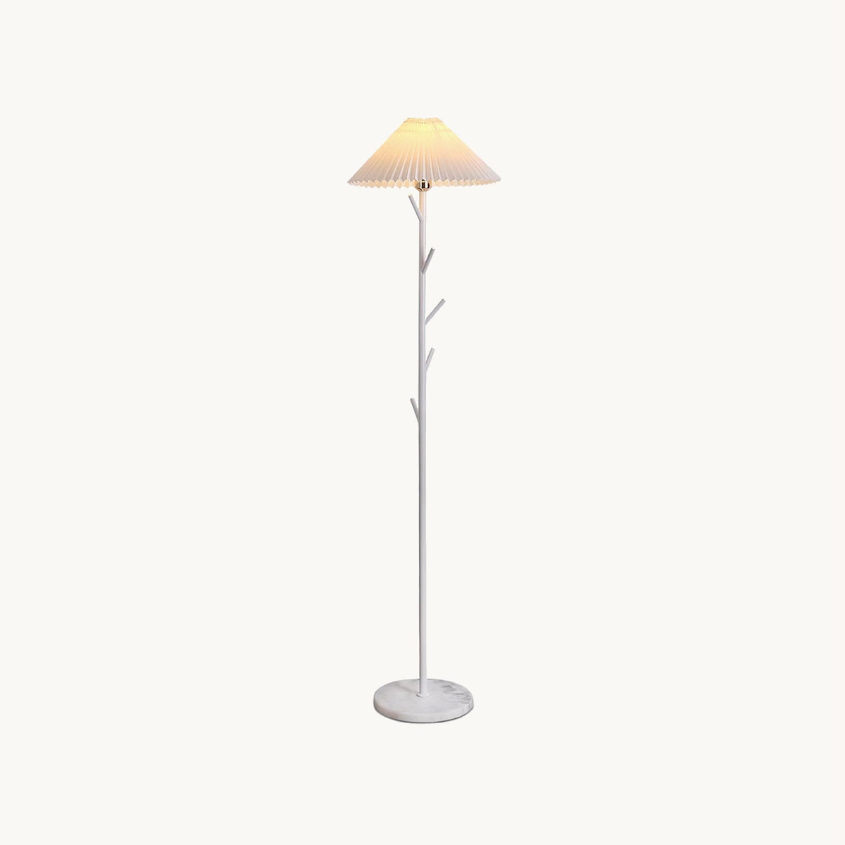 White Clérachic floor lamp with a pleated shade, branch-style pole and marble base, shown on a plain off-white backdrop.