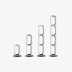 Four heights of the Clérachic glass floor lamp lined up on white, from one cylinder to four, each on a round black base.