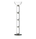 Tallest Clérachic glass floor lamp with a bowl shade over four stacked clear cylinders, on a round black base against white.