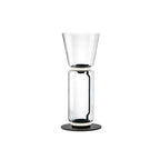 Clérachic glass floor lamp with a wide cone shade over a single large clear cylinder on a black base, on a white backdrop.