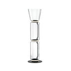 A Clérachic glass floor lamp with a cone shade over two clear cylinders and a black base, on a plain white backdrop.