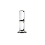 Clérachic glass lamp with two stacked clear cylinders and a ring of light at the top, on a round black base against white.