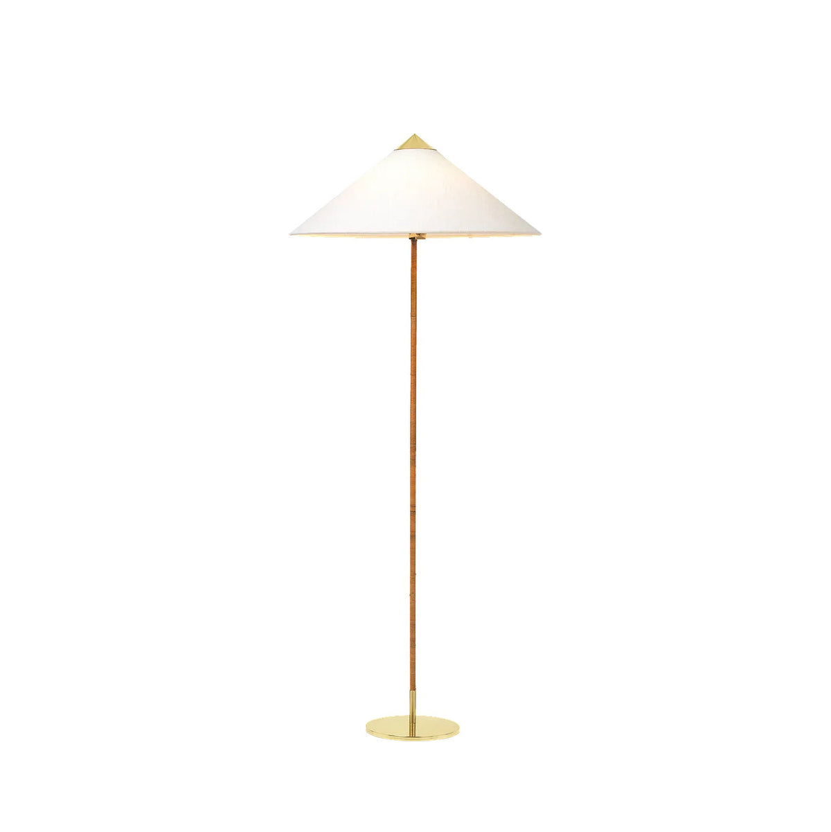Clérachic floor lamp with a white shade and a rattan-wrapped stem on a round brass base, on a plain white backdrop.