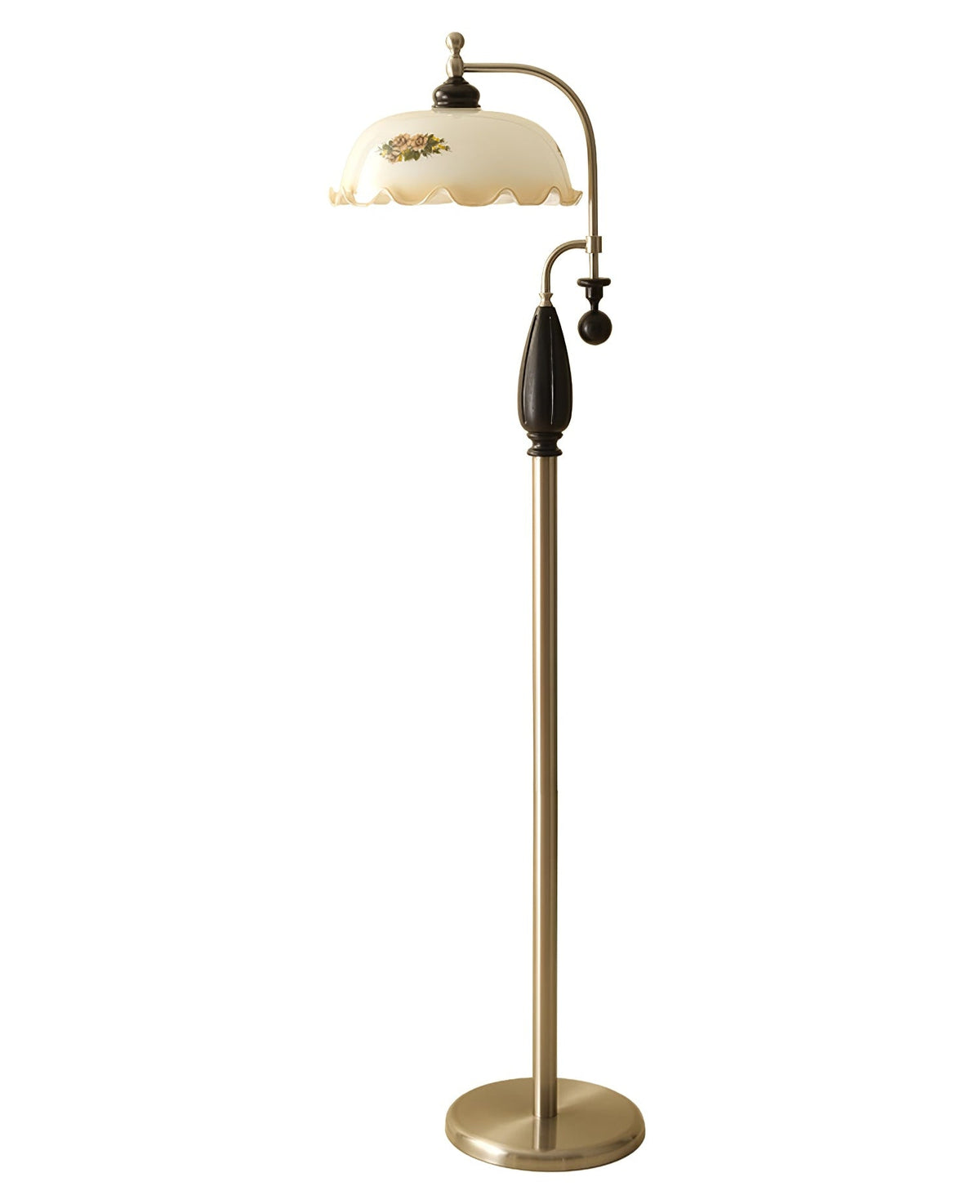 Nickel and black floor lamp on plain white, with a round nickel base and a frilled cream shade; from Clérachic.