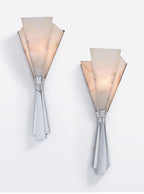 A pair of Clérachic Florent sconces on white, showing the size difference clearly.