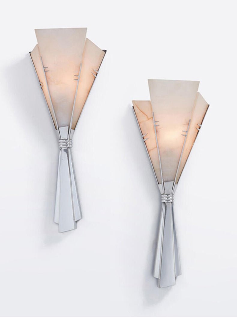 A pair of Clérachic Florent sconces on white, showing the size difference clearly.