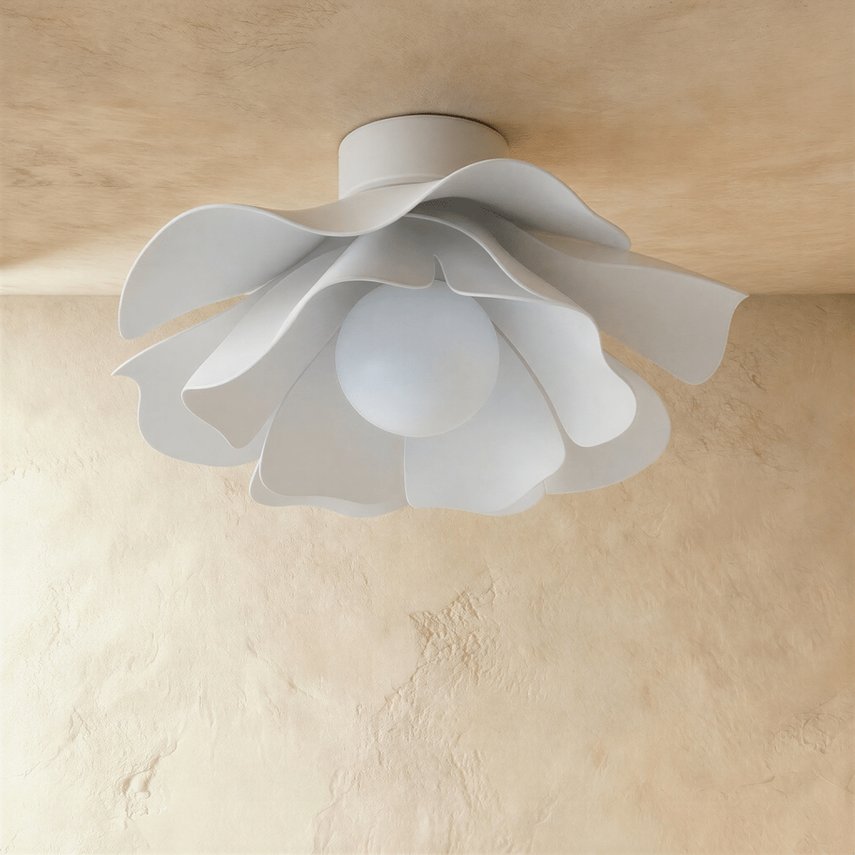 Clérachic flush ceiling light with a white wavy shade and frosted globe bulb, switched off, on a textured plaster ceiling.