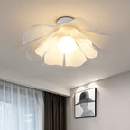 Clérachic white wavy-shade ceiling light glowing over a bedroom corner with sheer curtains and a framed print on the wall.