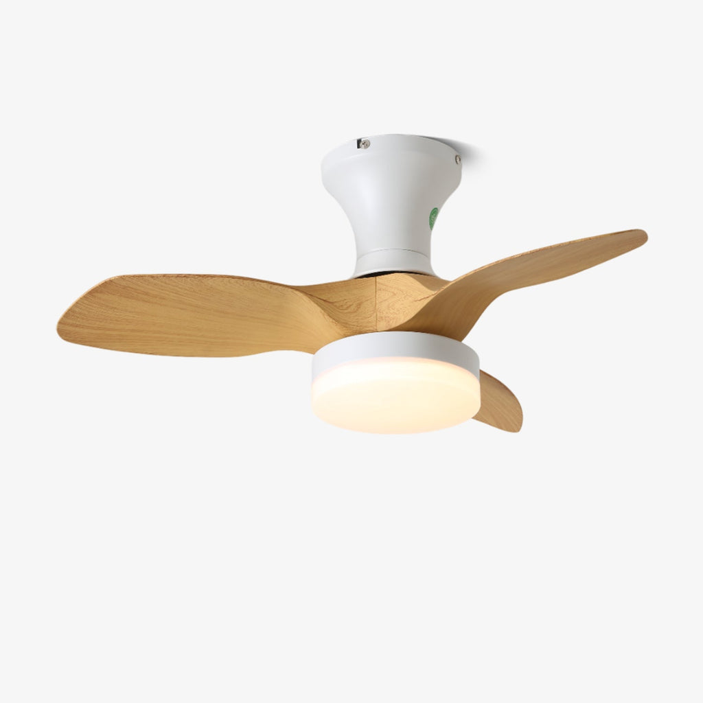 Side view of the Clérachic flush-mount fan, with its white stem, three wood-grain blades and lit round shade on a white background.