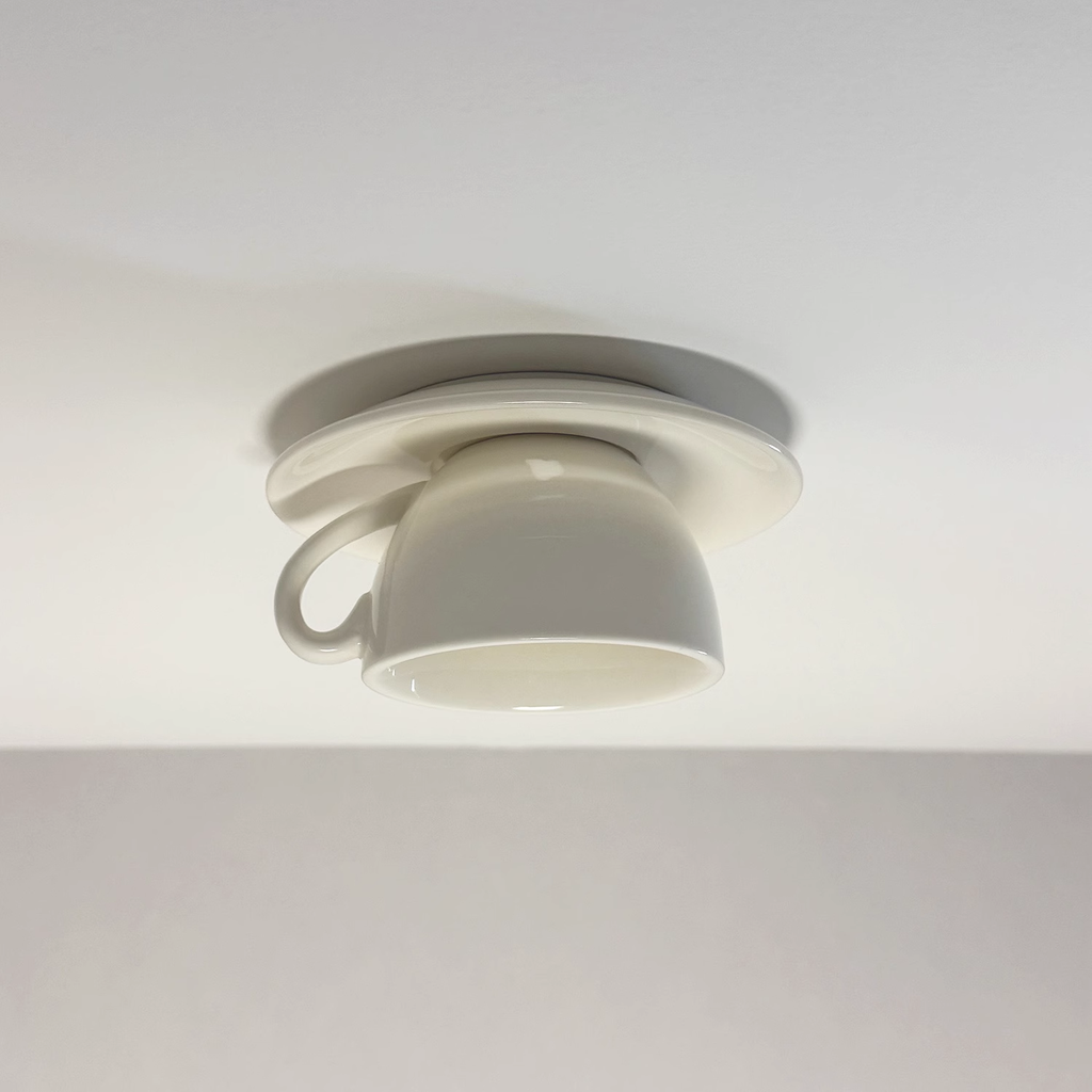 Clérachic's white ceramic coffee-cup flush mount shows the smooth glaze against gray.