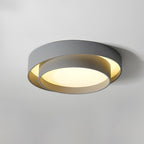 The Clérachic gray double-ring ceiling light is angled to show both rings catching the light.