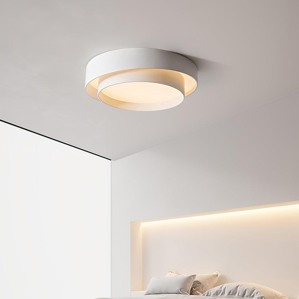 Clérachic's gray double-ring flush mount lights a narrow hallway corner near dark tile.