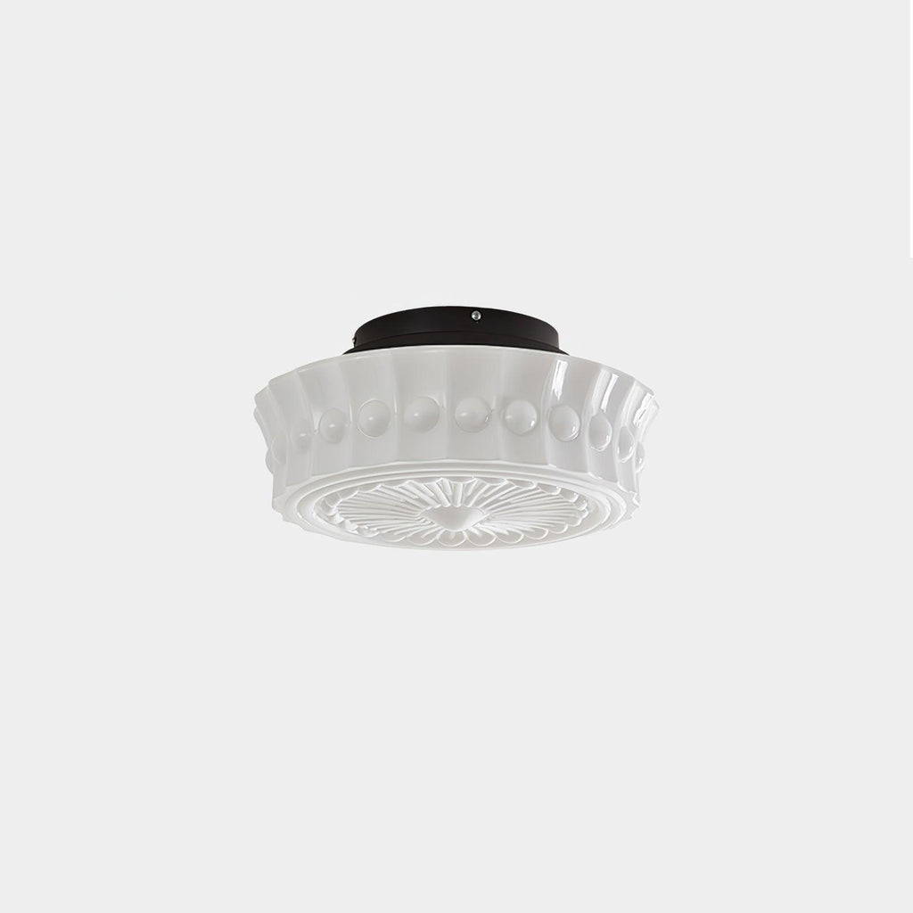 Three-quarter view of the Clérachic fluted opal glass flush ceiling light in white, unlit on a plain backdrop.