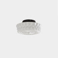 Three-quarter view of the Clérachic fluted opal glass flush ceiling light in white, unlit on a plain backdrop.