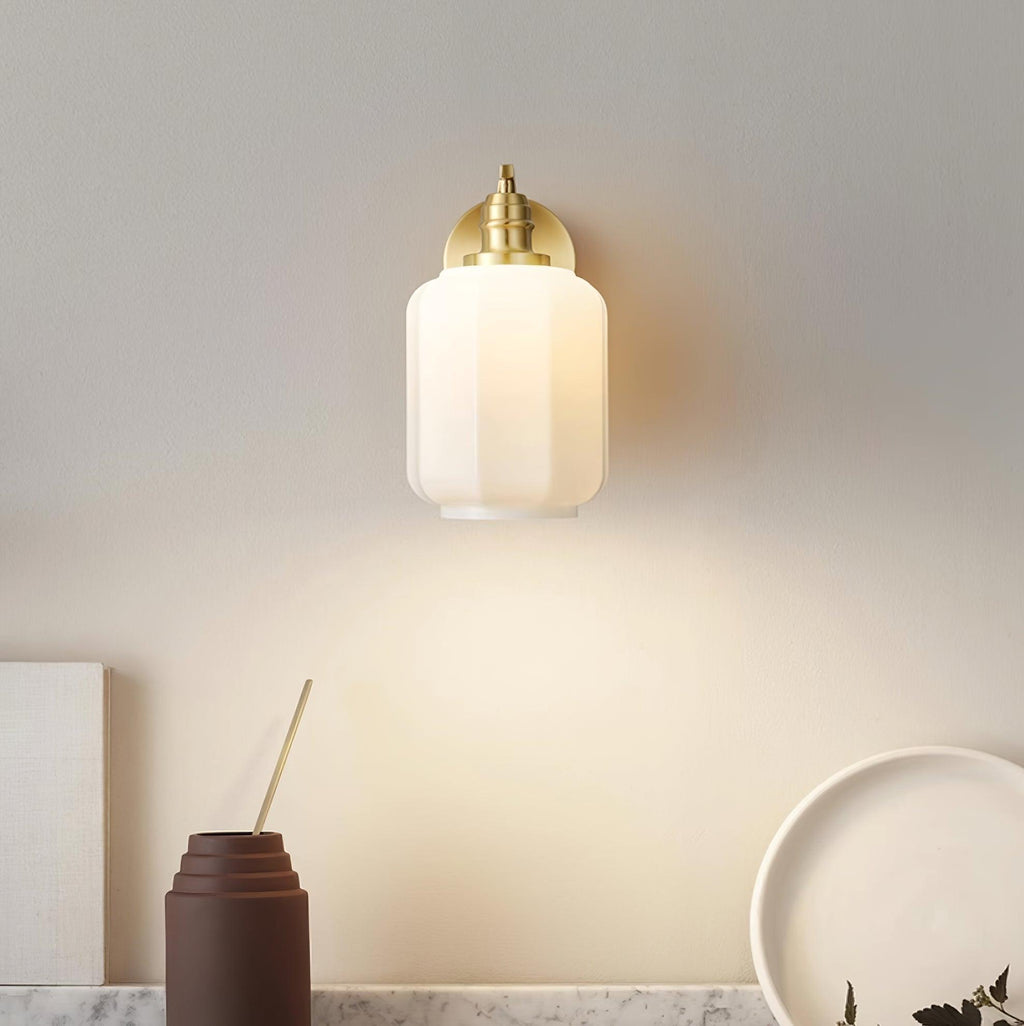 Clérachic Fluted White Glass Wall Sconce above a marble shelf, dropping a soft pool of light past a vase and a pale dish.