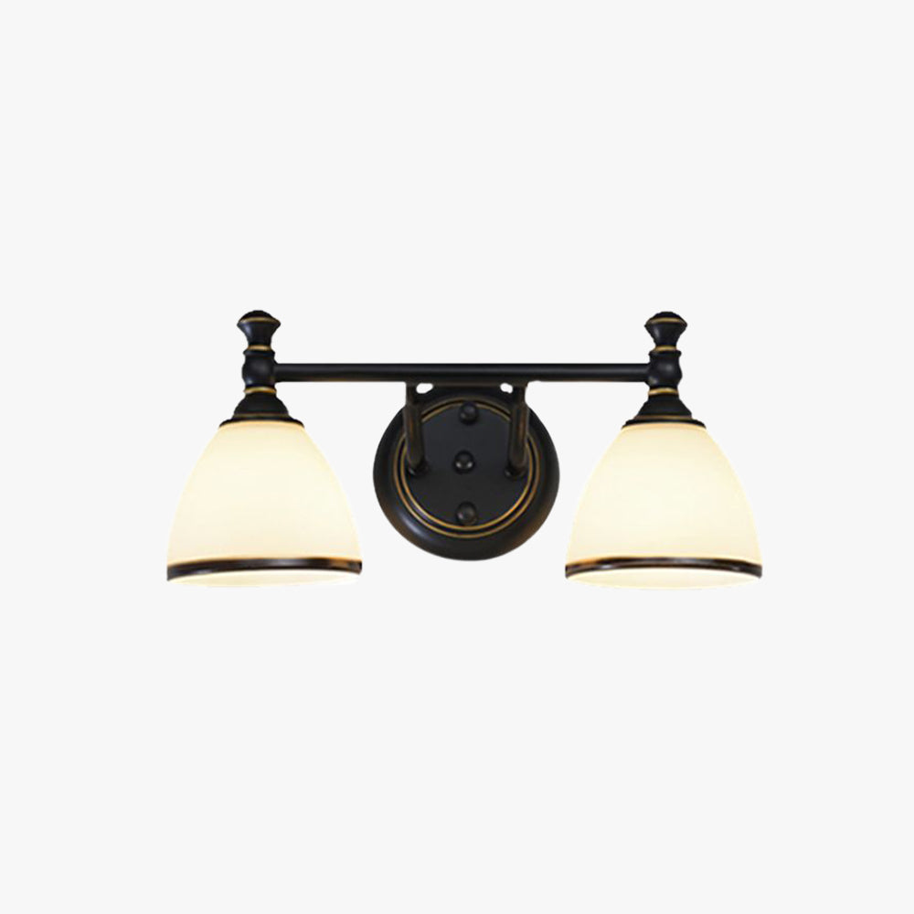 Studio front view of the two-light Clérachic frosted bell vanity light, opal glass shades rimmed in antique gold on a black bar.