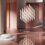 A large cluster of tiny frosted Clérachic pendants hangs in a pink stone atrium, reflected in the water below.
