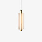 A single-head Clérachic pendant with a frosted white shade and a gold base, lit warm, on a plain white backdrop.