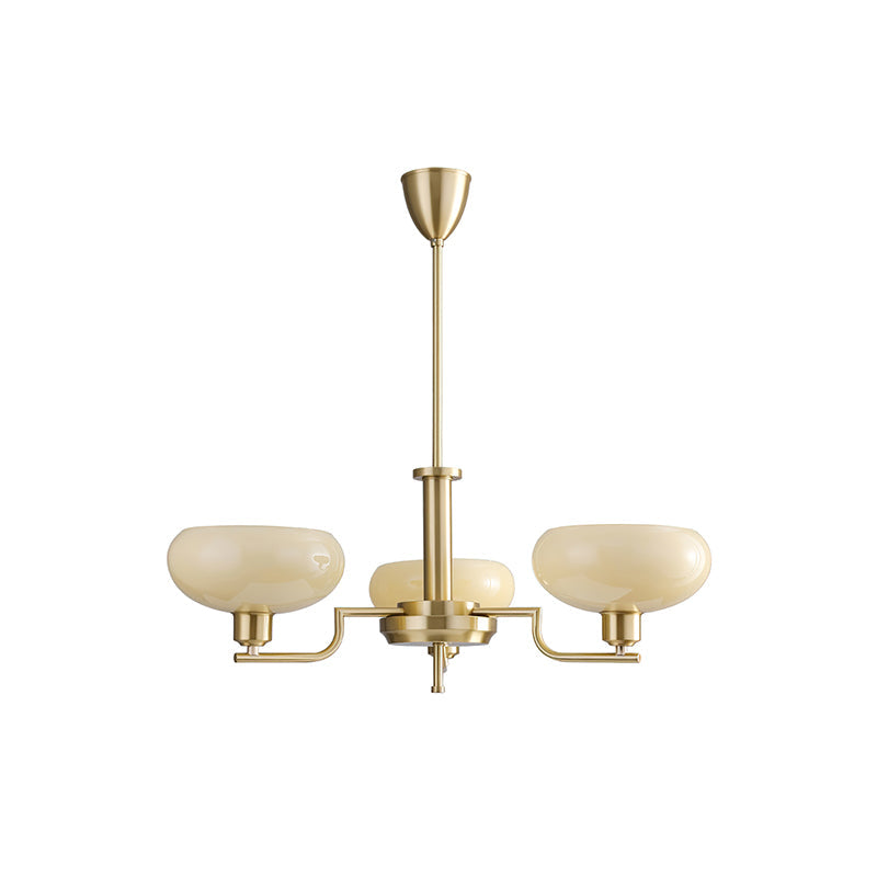 Smaller three-head gold Clérachic chandelier on white, three pale beige glass domes on slim brass arms.