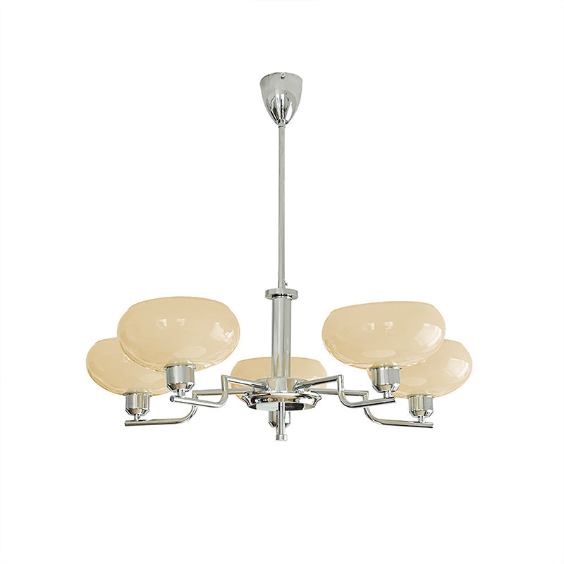 Five-head chrome Clérachic chandelier on white, amber-beige glass domes on polished arms under a silver canopy.